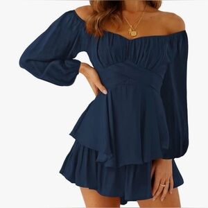Navy blue mini dress with shorts underneath with ruffle detail
